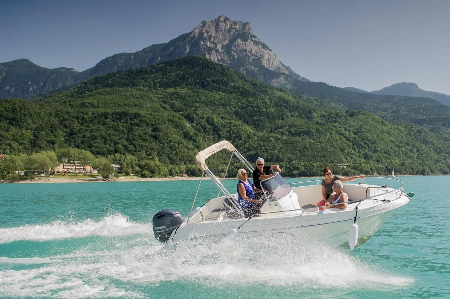 Pacific Craft 545 Open — A group of people are enjoying a ride on a Capelli Tempest