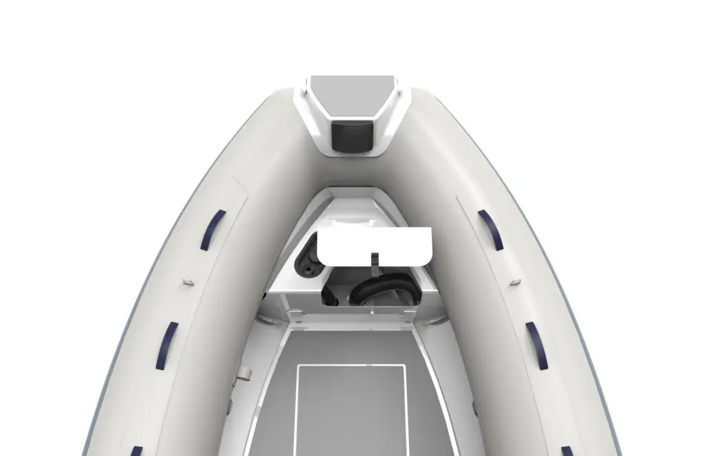 Highfield CL 380 BLT — Vue plongeante d’un bateau pneumatique blanc avec console centrale et plancher gris.