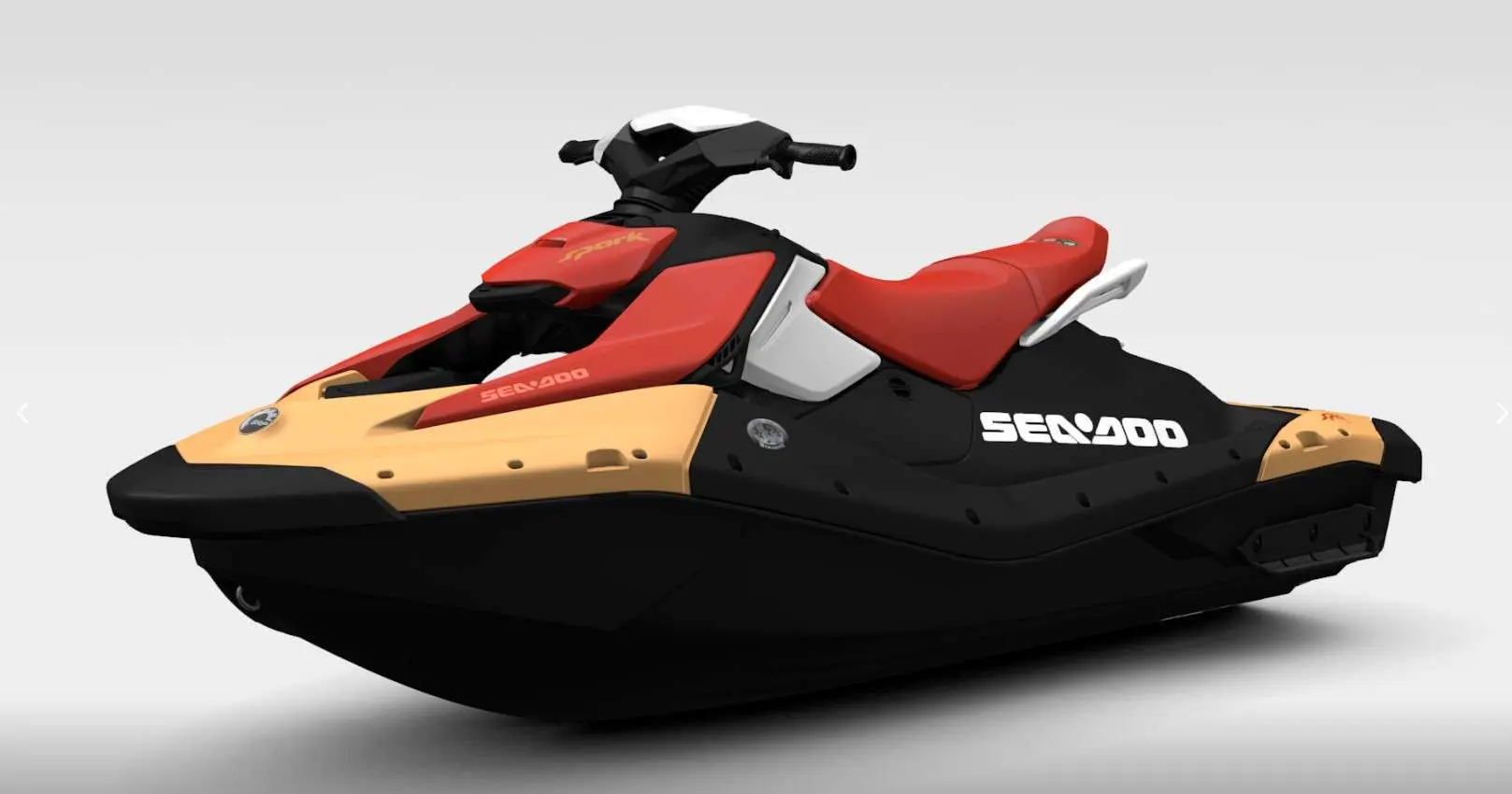 Sea Doo Spark — Motonautique à jet rouge, noire et jaune photographiée de profil sur fond clair.